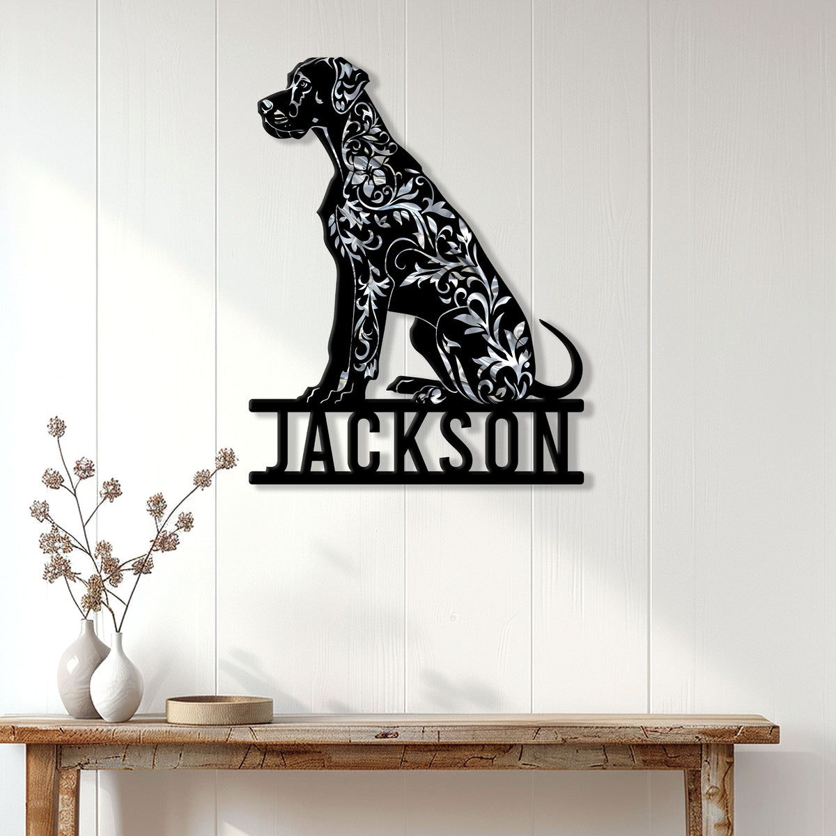 Great Dane metal wall sign displayed on a light paneled wall above a console table