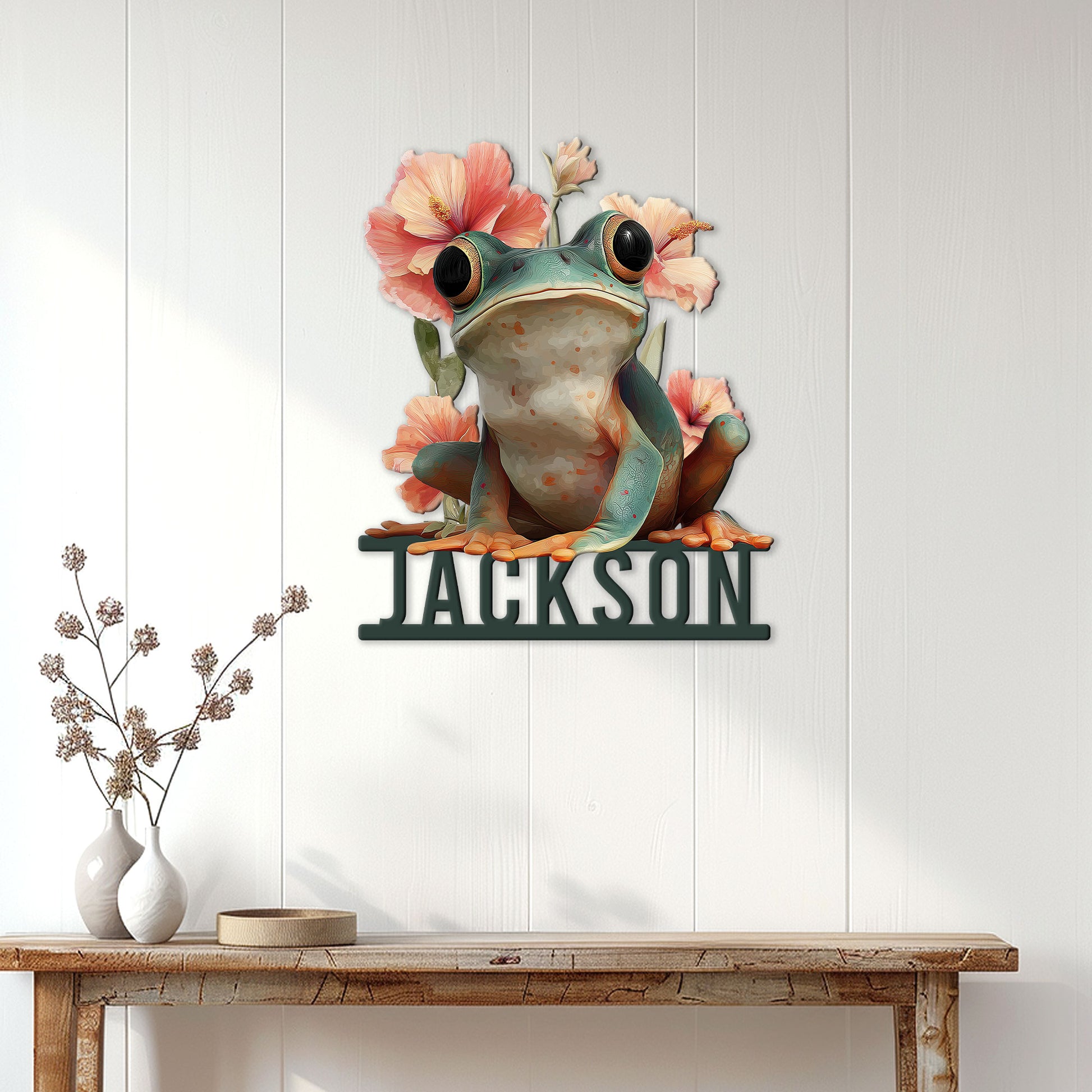 Floral frog metal sign displayed as wall decor above a rustic console table in a bright home entryway