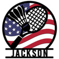 Badminton metal sign featuring crossed rackets and a shuttlecock over an American flag-inspired background