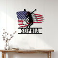 Badminton wall sign displayed on a white paneled wall above a rustic console table