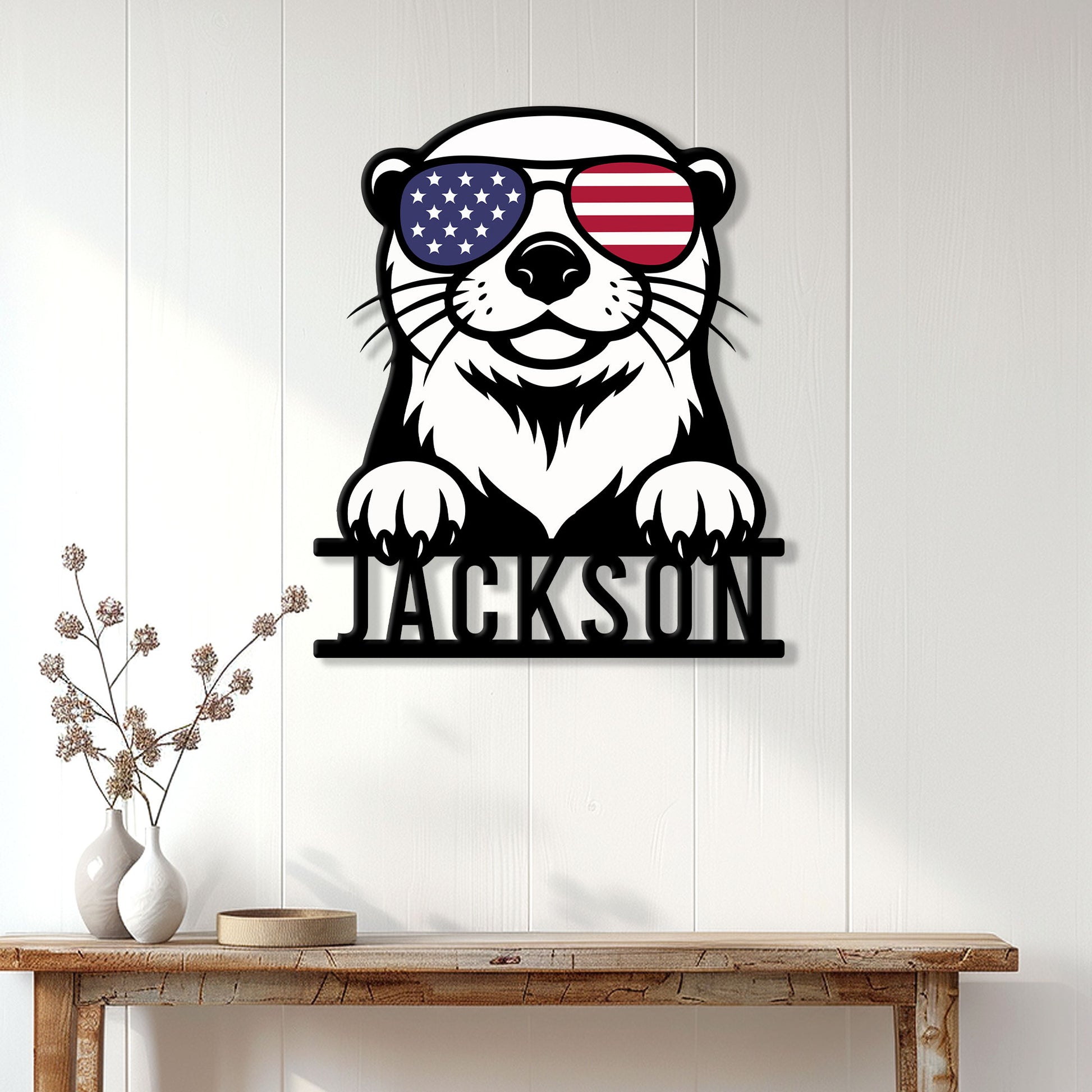 Patriotic otter wall sign displayed on a white paneled wall above a rustic console table