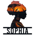 African woman silhouette metal sign featuring a savanna sunset, acacia tree, giraffes, and traditional-inspired patterns