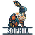 Floral rabbit metal sign featuring a colorful botanical bunny silhouette with a dark decorative nameplate