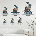 Floral rabbit metal sign shown in multiple size options as wall decor in a bright living room