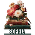 Floral book lover metal sign featuring stacked vintage books, colorful flowers, and a perched songbird