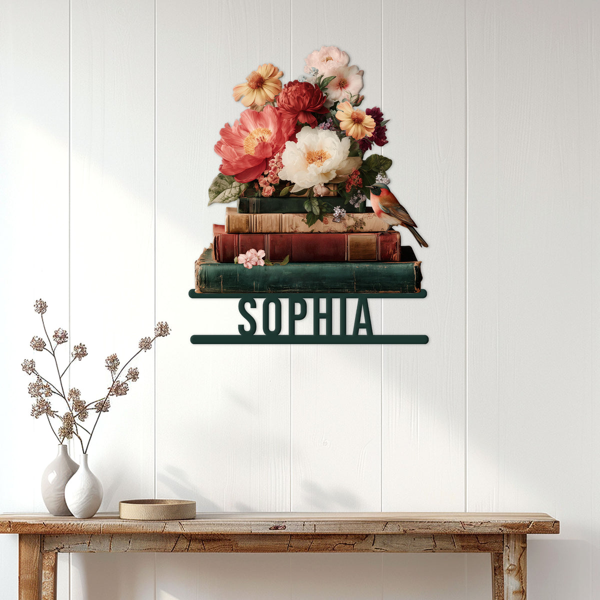 Book-themed metal wall sign displayed above a console table in a bright reading-inspired room
