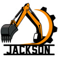 Bold orange excavator and gear artwork displayed on a custom metal sign for construction decor