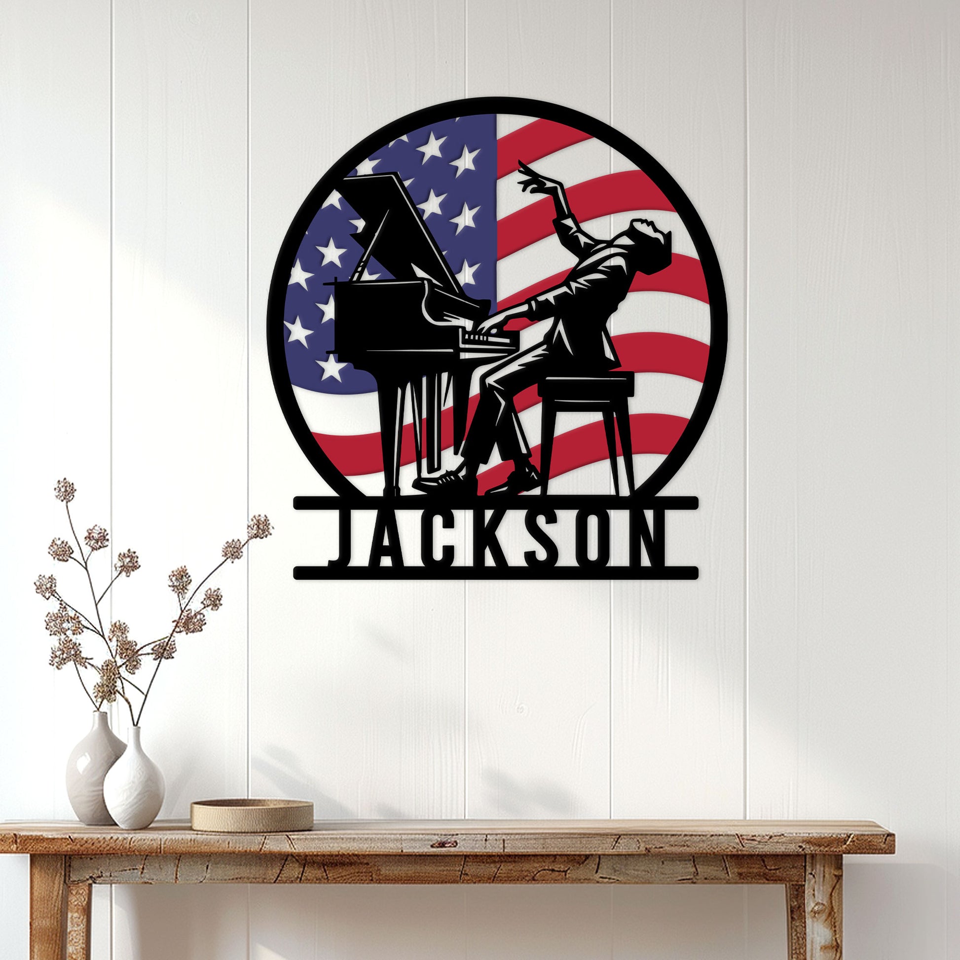 Patriotic pianist metal sign displayed on a white paneled wall above a wood console