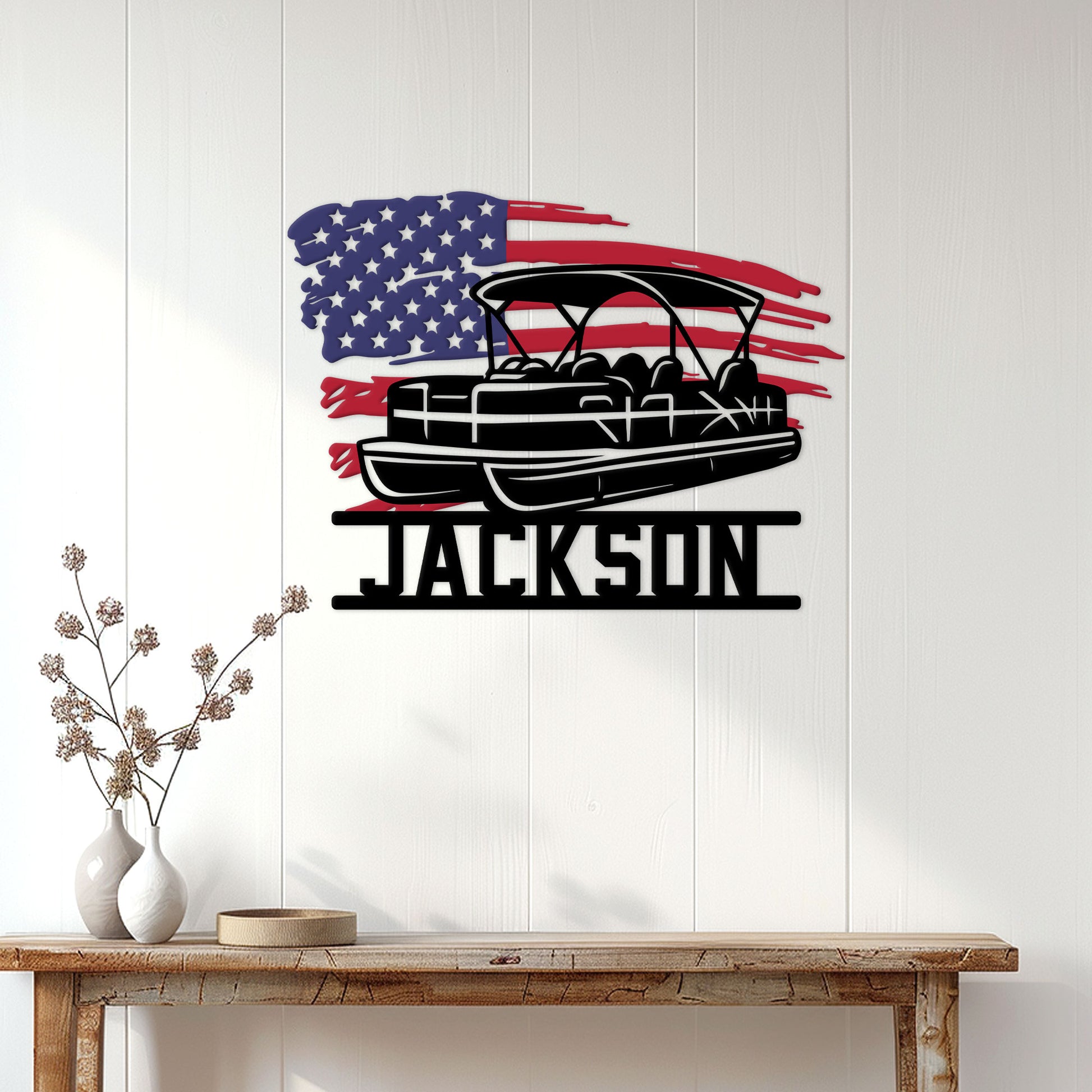 Patriotic pontoon boat wall sign displayed on a light paneled wall above a console table