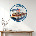 Pontoon boat wall decor displayed on a light wood-paneled wall above a console table