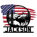 Patriotic moose metal sign featuring a moose silhouette, mountain lake scene, pine trees, and American flag