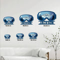 Snowmobile goggles metal sign shown in multiple size options on a bright living room wall