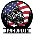 Custom snowmobile metal sign featuring a rider on a sled against a patriotic American flag background