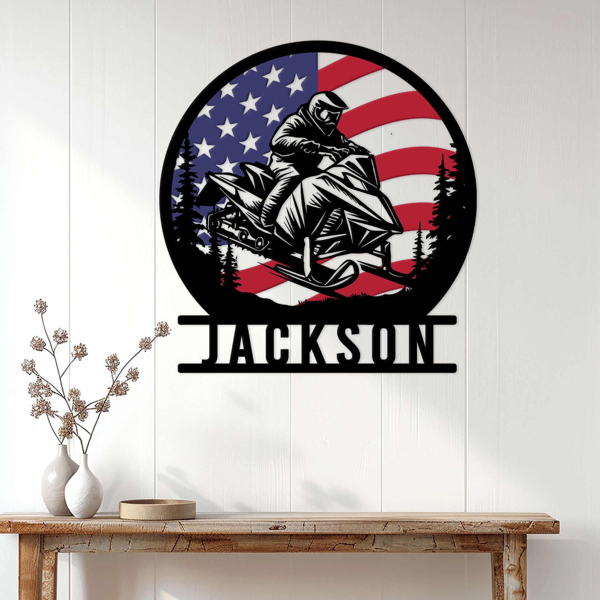 Snowmobile metal wall decor displayed in a home entryway with a bold rider and patriotic outdoor theme