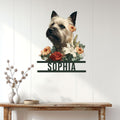 Cairn Terrier floral wall sign displayed above a console table in a bright home entryway