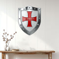 Knights Templar shield wall decor displayed in a bright entryway above a wooden console table
