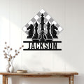 Chess metal sign displayed on a light wood-paneled wall above a console table