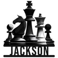 Black-and-white chess metal sign featuring king, queen, knight, rook, bishop, and pawns