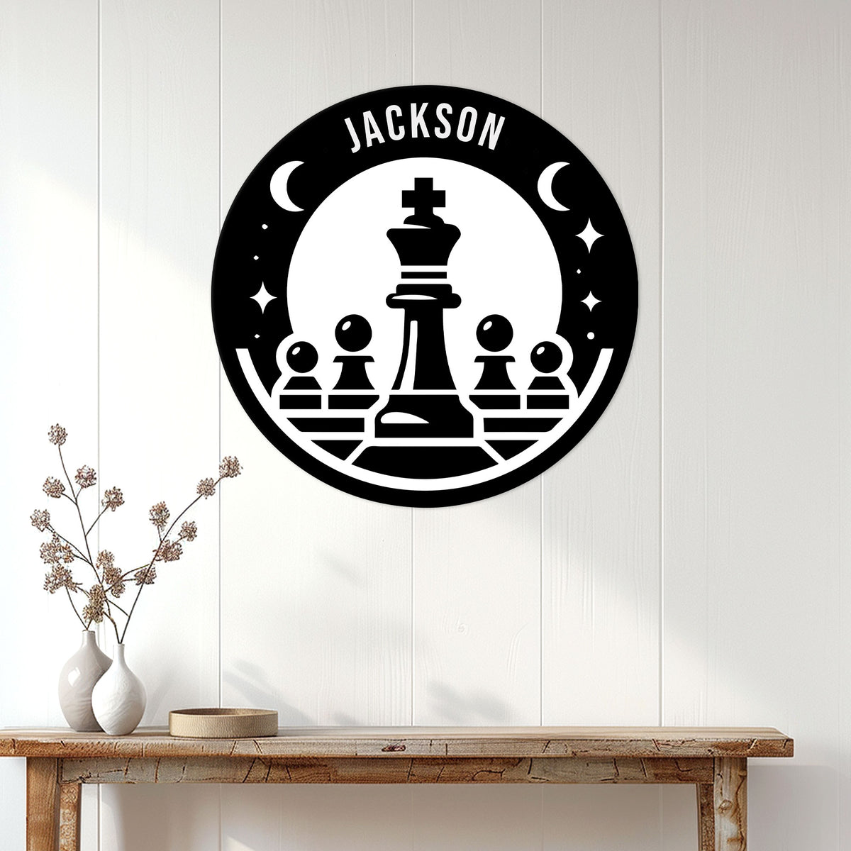 Chess wall decor displayed above a console table, featuring a bold king and pawns silhouette