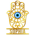 Ornate gold Hamsa hand metal sign with a blue and turquoise evil eye centerpiece