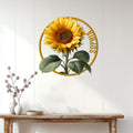 Sunflower metal wall sign displayed on a white paneled wall above a rustic console table