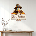 Custom Thanksgiving turkey metal sign displayed on a white paneled wall above a console table