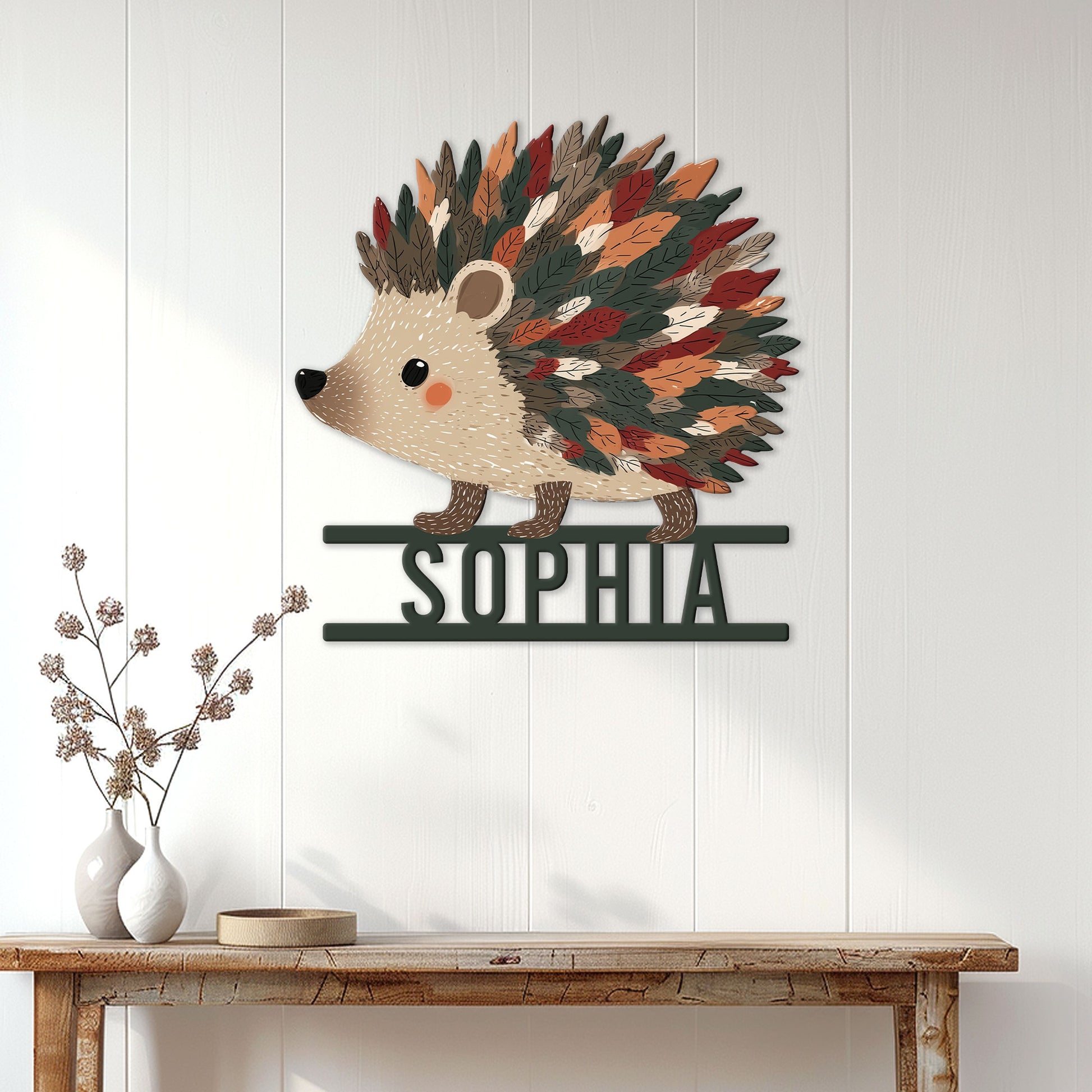 Hedgehog metal wall sign displayed on a white paneled wall above a wood console table