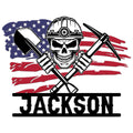 Miner metal sign featuring a hard-hat skull, crossed shovel and pickaxe over a distressed American flag