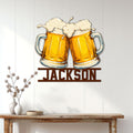 Beer wall sign displayed on a light paneled wall above a console table in a home decor setting