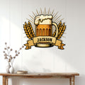 Beer mug metal wall sign displayed on a white paneled wall above a rustic console table