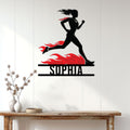 Flame runner metal sign displayed on a white paneled wall above a console table