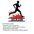 Cut metal running sign featuring a dynamic female runner silhouette and flame-inspired motion design