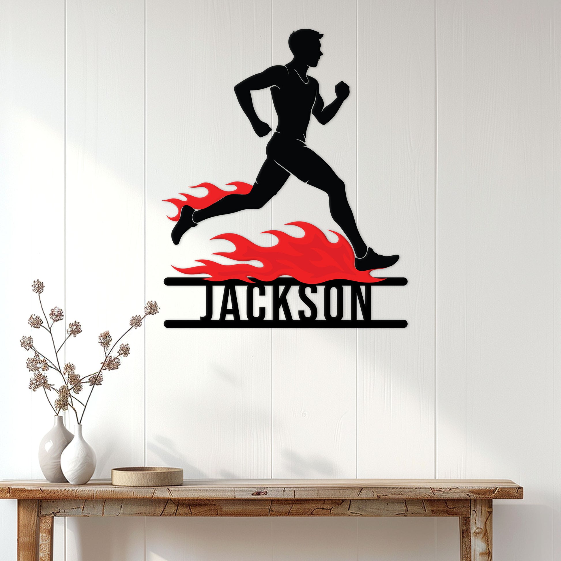 Female runner metal wall sign displayed on a bright paneled wall in a home decor setting