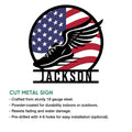 Cut metal running sign with a winged shoe and American flag artwork shown on a white background