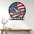 Patriotic runner wall decor displayed on a white paneled wall above a wooden console table