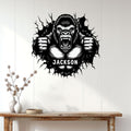 Roaring gorilla wall sign displayed above a console table in a modern home entryway