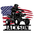 Custom ATV metal sign featuring a helmeted quad rider in front of a distressed American flag design