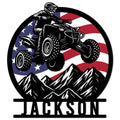 Custom ATV metal sign featuring a helmeted rider, American flag background, and mountain silhouette