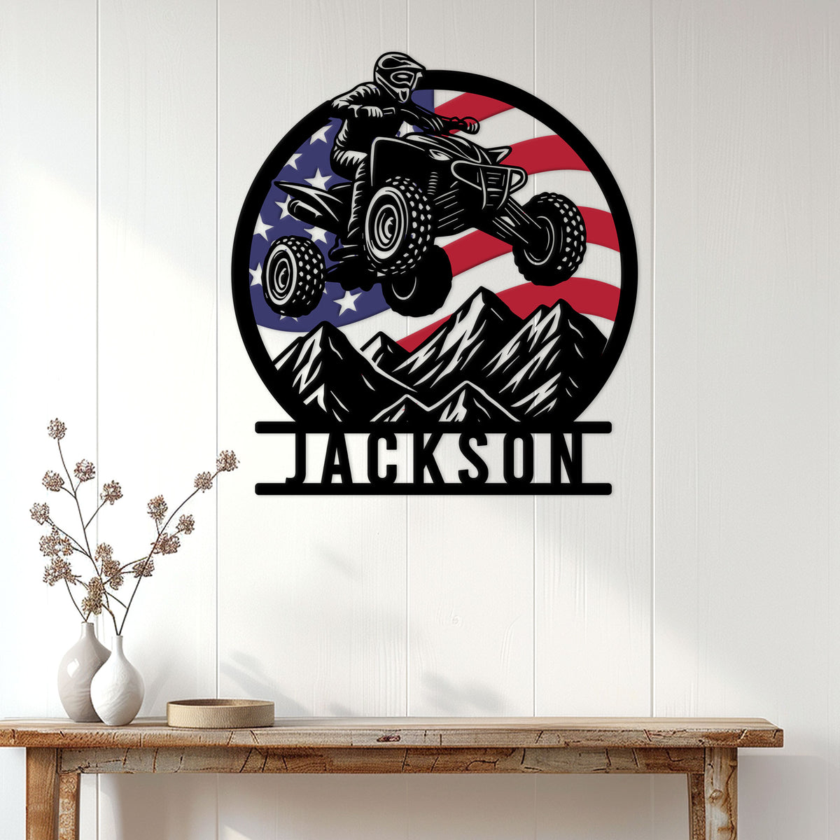Patriotic ATV wall sign displayed on white wood paneling above a console table