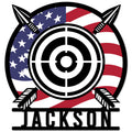 Patriotic archery metal sign featuring a black target, crossed arrows, American flag design, and custom lower display