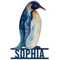 Decorative cut metal sign featuring a blue and gold penguin with ornate feather details