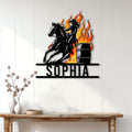 Barrel racing metal wall sign displayed on a bright paneled wall above a rustic console table
