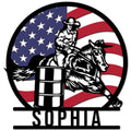 Barrel racing metal sign featuring a cowgirl and horse turning a barrel against an American flag backdrop
