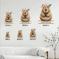 Capybara metal sign size comparison guide showing multiple square size options on a living room wall