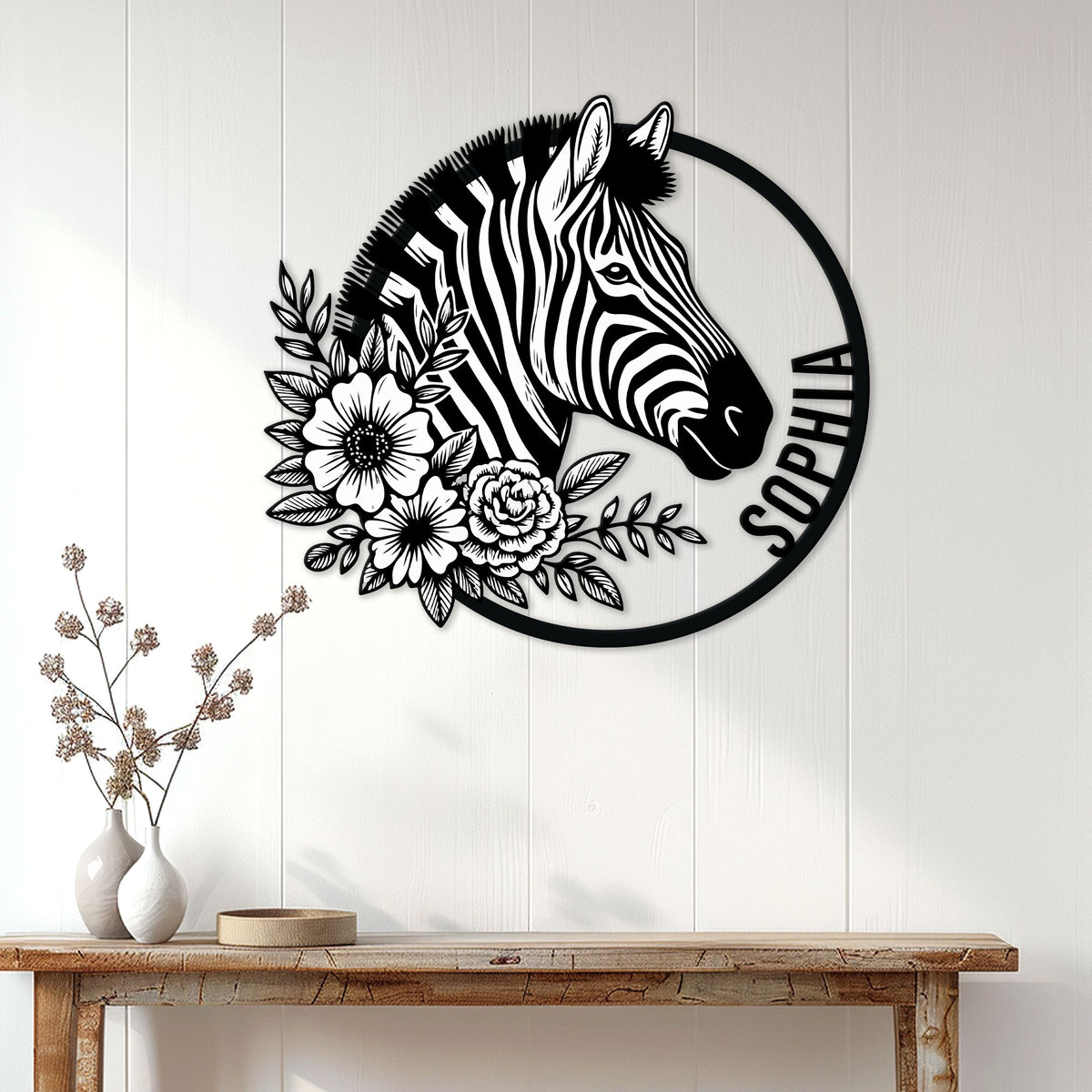 Floral zebra metal wall sign displayed above a console table in a bright home entryway