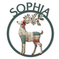 Custom reindeer metal sign with a patchwork-style deer, holly antlers, red bow, and circular frame