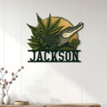 Alligator wall sign displayed on a bright paneled wall above a console in a nature-inspired room