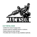 Tattoo artist metal sign featuring a bold tattoo machine design and cut-metal sign details