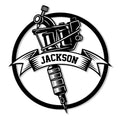 Custom tattoo artist metal sign featuring a tattoo machine, ink tools, circular frame, and bold banner