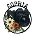 Custom photographer metal sign featuring a vintage camera framed by colorful flowers and leafy botanical accents